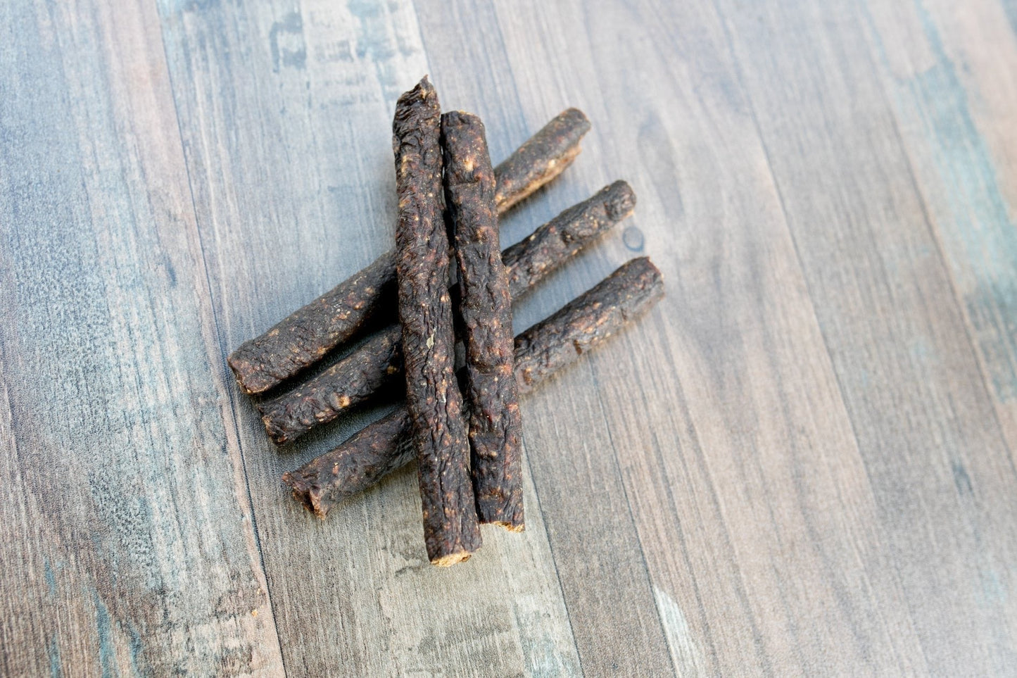 Dog Treats made with organic all natural 100% bison meat, for your cats and dogs. Bison roll packages show that they are Free of Glycerine, Gluten, Grain & Preservatives.