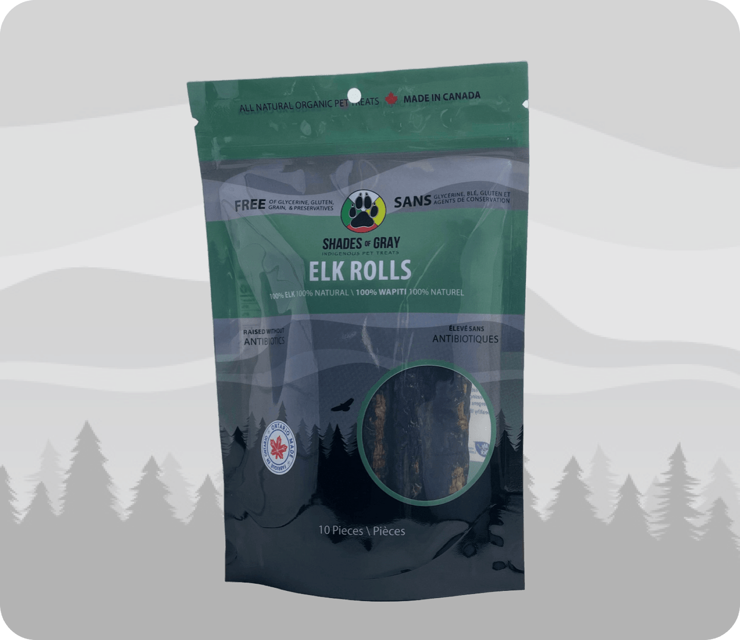A package of Elk Roll dog treats are showcasing 10 per package and made in Ontario. Logo for Shades of Gray Indigenous Pet Treats is on the packaging.
