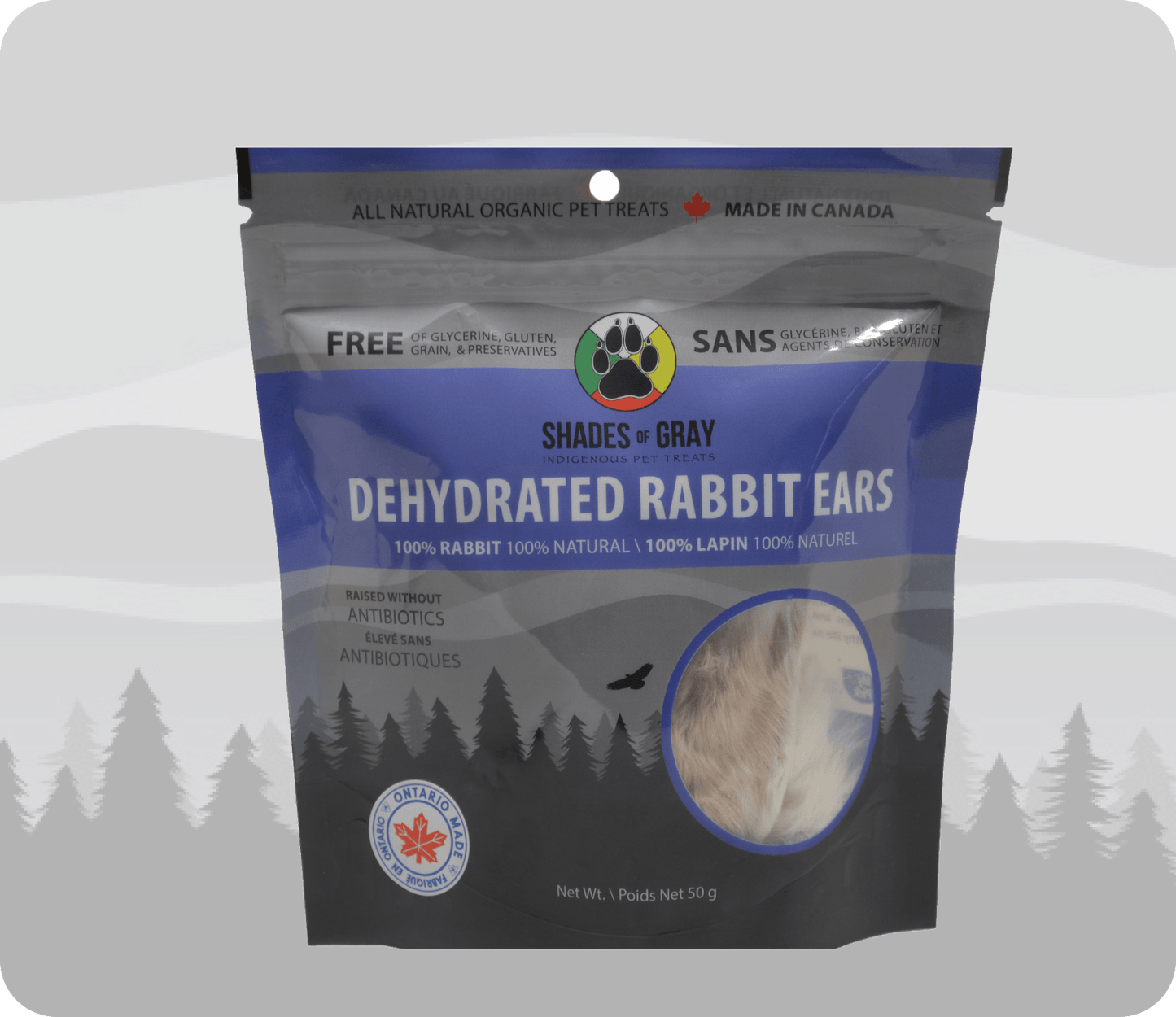 Front view of Shades of Gray Indigenous Pet Treats Dehydrated Rabbit Ears pet treats package, featuring the Made in Ontario logo and brand logo