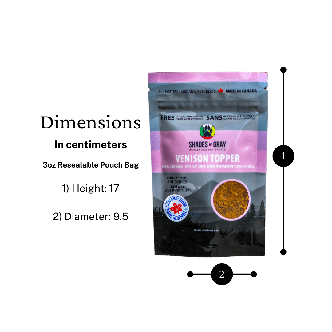 Alt Text for Venison Topper Product Page "Image of Shades of Gray Indigenous Pet Treats' Venison Topper packaging, a pink 3oz resealable pouch bag with dimensions labeled in centimeters: 1) Height: 17cm, 2) Diameter: 9.5cm. Features 100% venison, raised without antibiotics, 100% natural, and free of glycerine, gluten, grain, and preservatives. Includes 'Made in Canada' and 'Ontario' badges with a paw print logo.