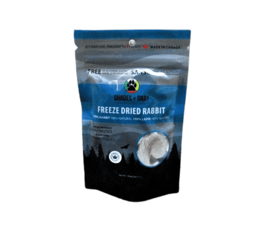Front of a blue Shades of Gray Freeze-Dried Rabbit bag, with a window showing light, single-ingredient freeze-dried rabbit tenderloin pieces. 100% rabbit, raised without antibiotics, for dogs and cats.